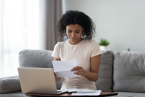 woman looking at financial policy